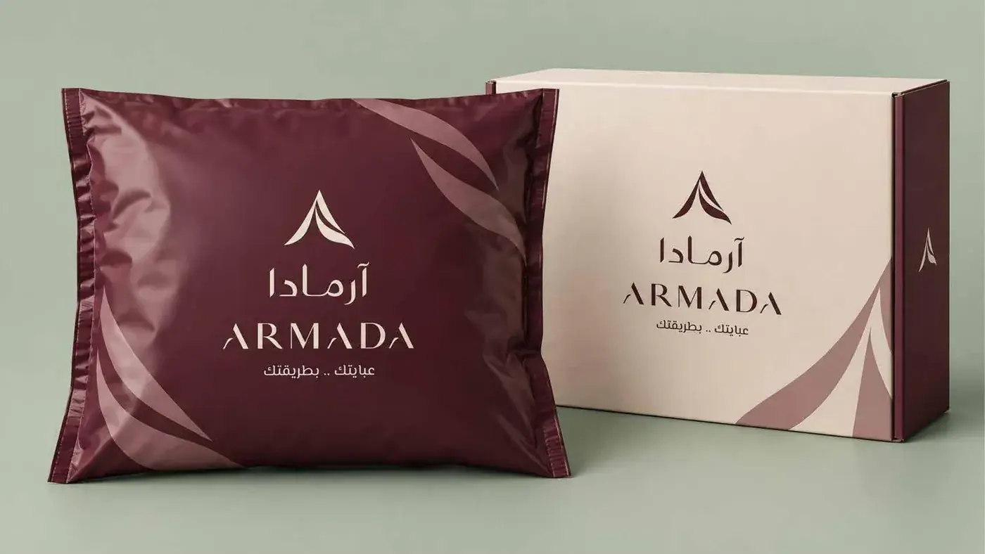 آرمادا — هوية بصرية لعلامة عبايات — كيس الشحن وعلبة التوصيل